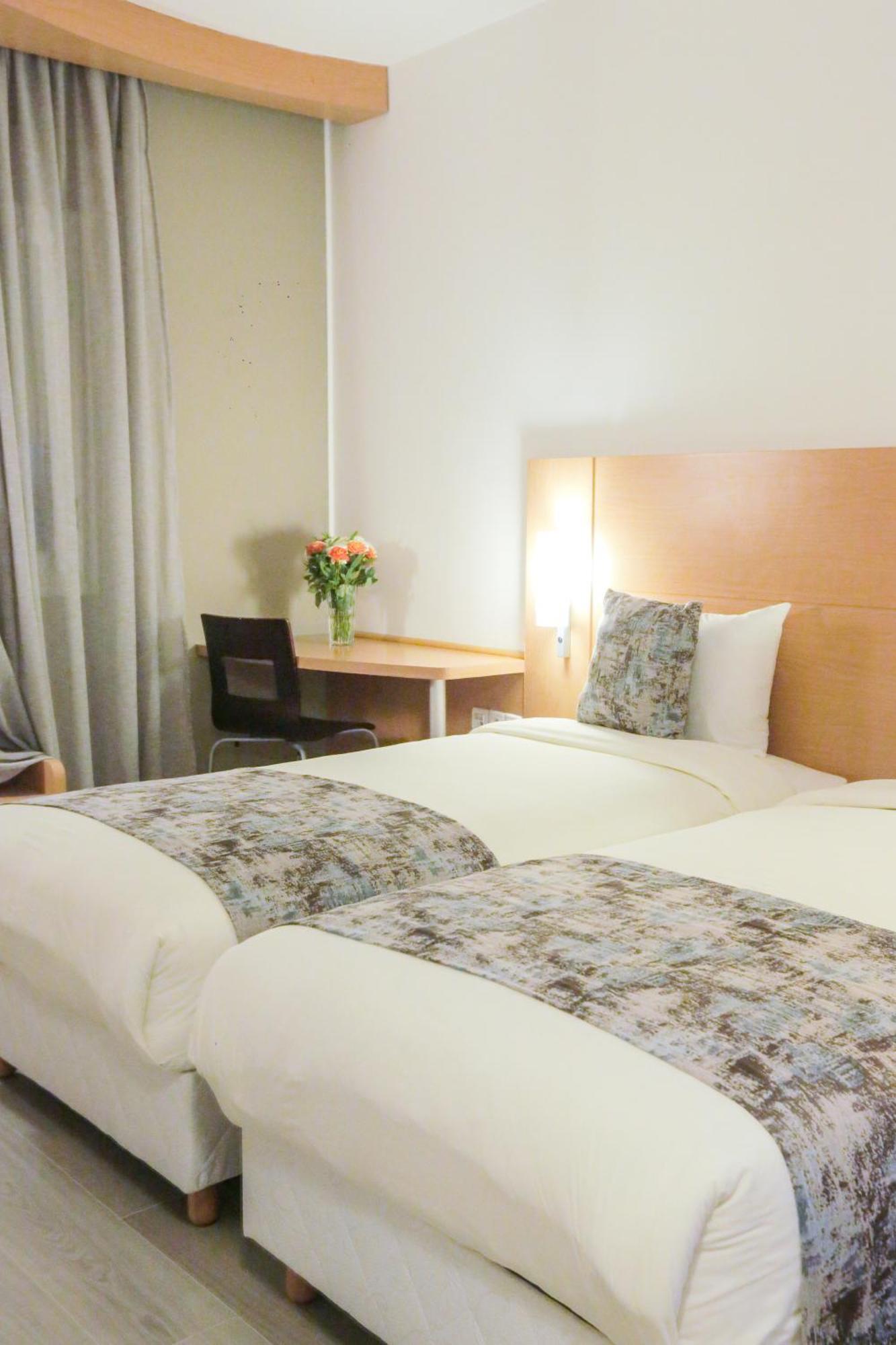 Chambre Lits Jumeaux - Vue sur Piscine