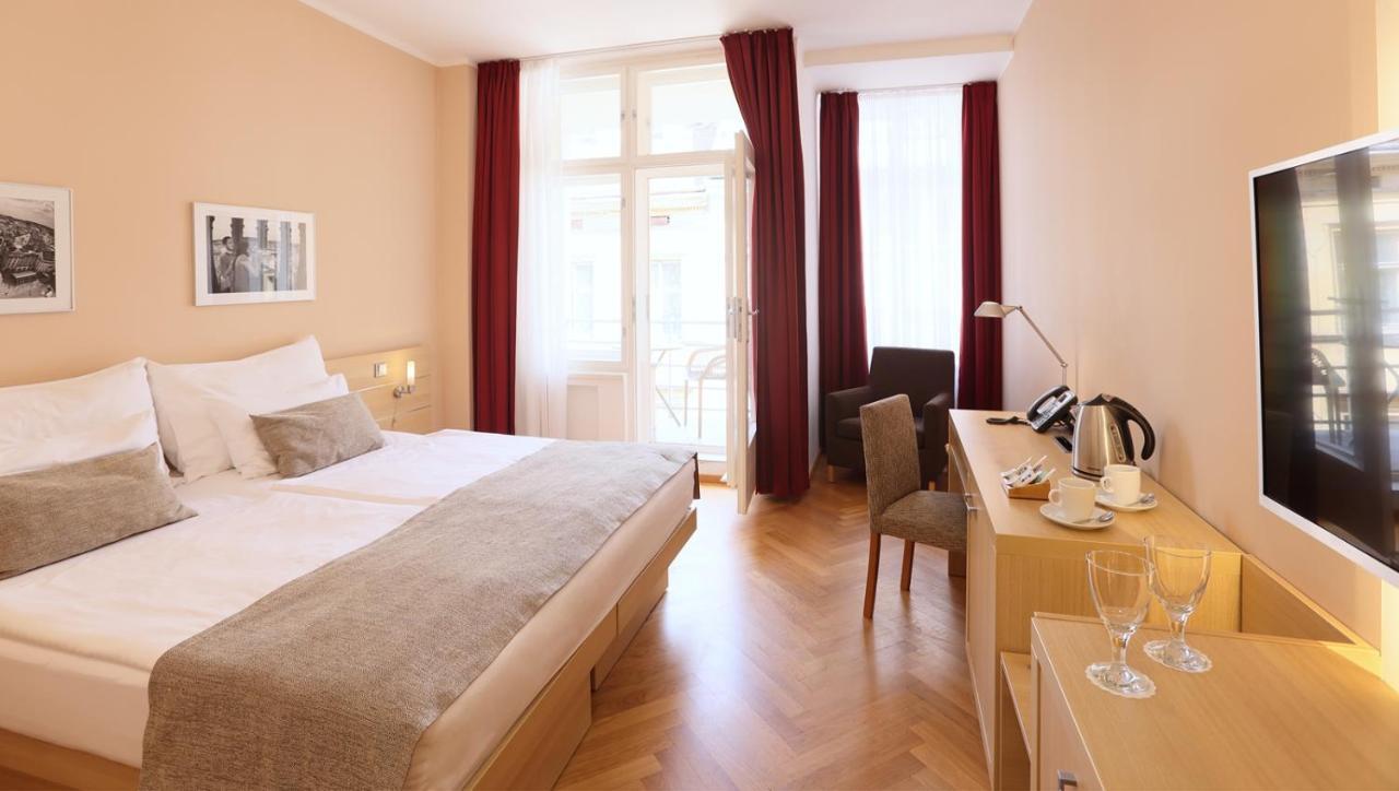 Luxe Kamer met 1 of 2 Bedden en Balkon