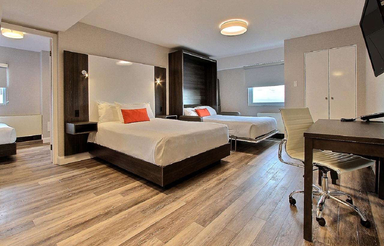 Chambre Standard avec 1 Lit Queen-Size et 1 Lit Queen-Size Escamotable