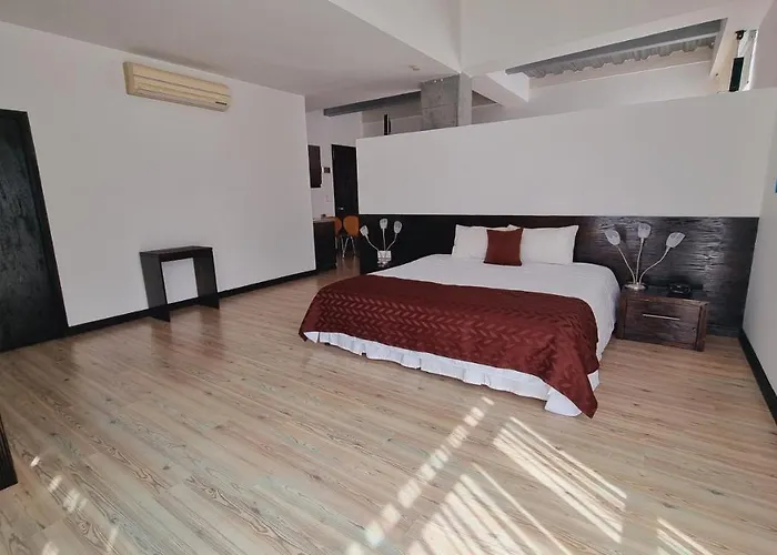 Habitat Suites Hotel By Gho Hoteles