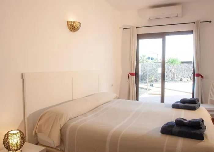 El jardín de Juanita - ROOMS