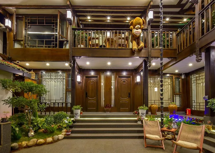 Golden Dragon'S Mountain Glow Inn Chinese Style Courtyard Of Lijiang Ancient Town Close To Main Streets Near By Dashiqiao Sifang Street,Big Water Wheels,We Offer Tickets Purchasing Services,Free Station Pick-Up For Three Nights Of,Provide Nutritious