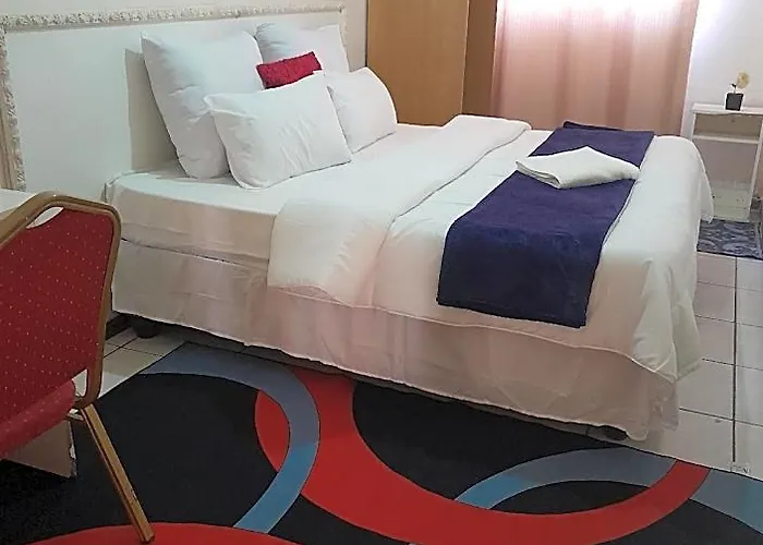 Manzini Palms Inn