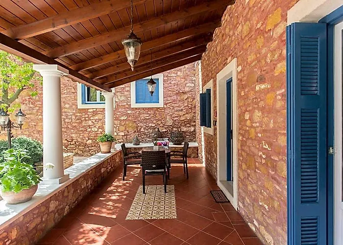Dine On The Generous Veranda At A Rustic Stone Getaway