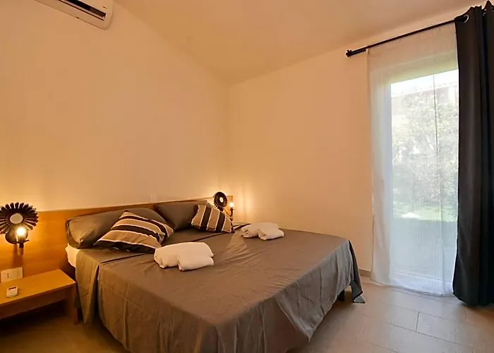 Isa - Residence In Costa Rei Just 450 Meters From The Beach, Apartments With Air Conditioning And Outdoor Private Area