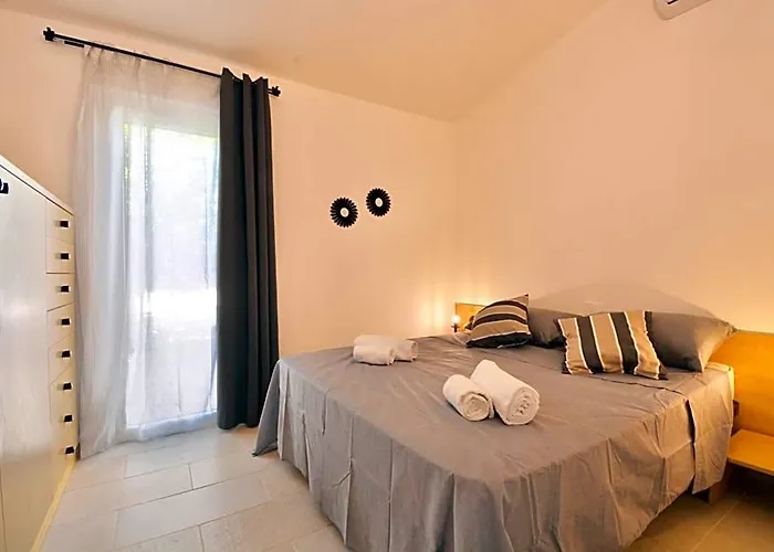 Residence In Costa Rei Just 450 Meters From The Beach, Apartments With Air Conditioning And Outdoor Private Area
