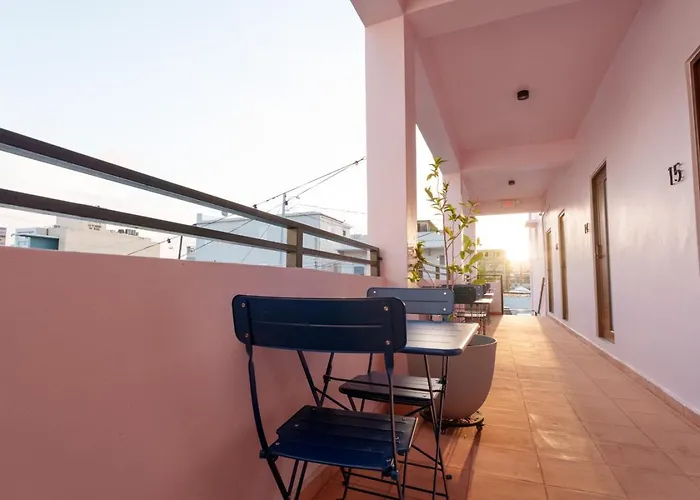 Room 13: Breezy Veranda Stay With City Views